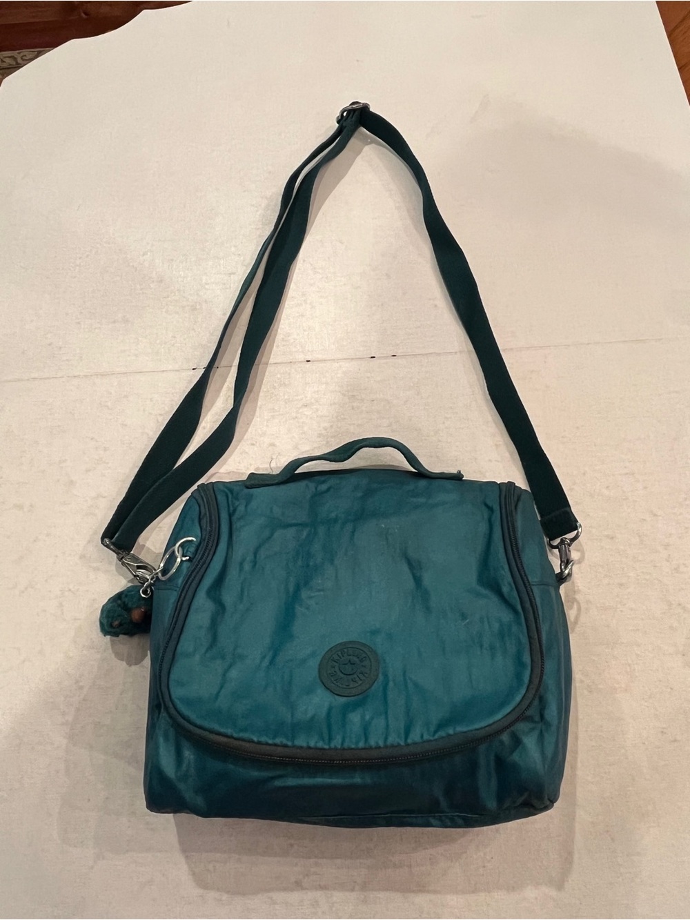 Vintage Kipling Teal Green Nylon insulated lunch box with Crossbody strap. GUC!